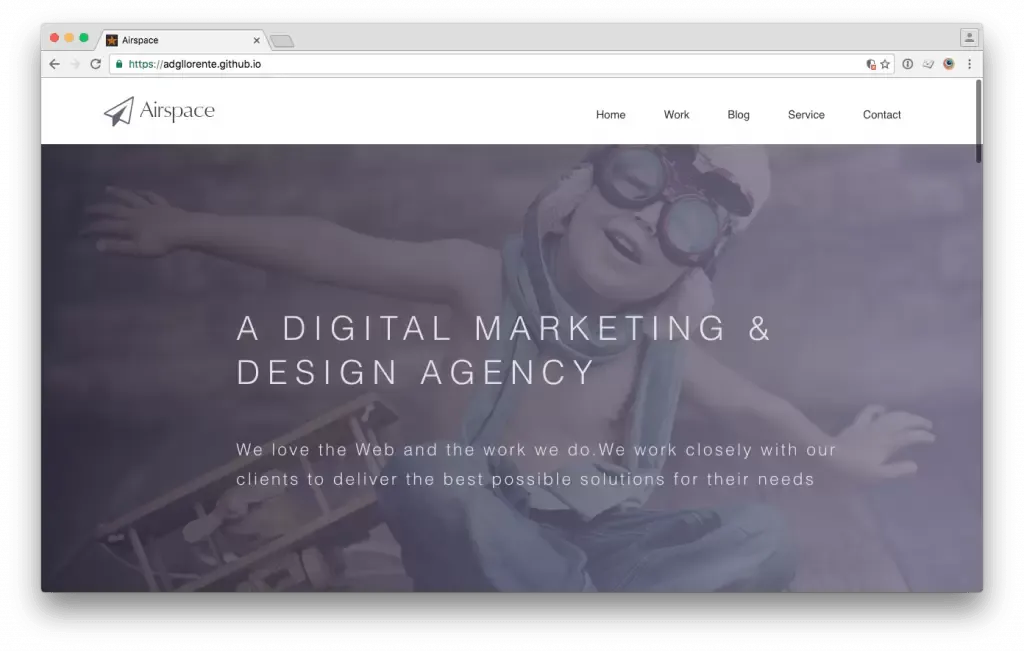 Website with a beautiful template named AirSpace. Showing a child with glasses and a wooden plane behind him.